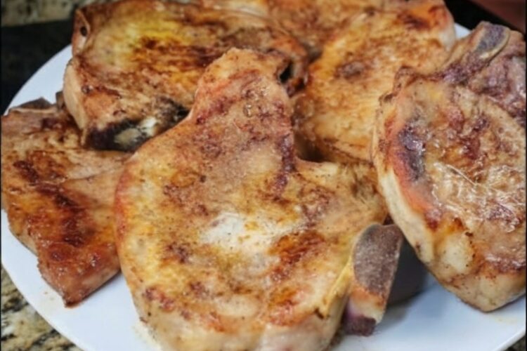 Tender bone-in pork chops seared until golden, then coated in a sweet-tangy glaze of mayonnaise, Dijon mustard, and honey, and baked until perfectly cooked. The mayonnaise keeps them incredibly moist while creating a caramelized coating under the broiler. Restaurant-quality results in under an hour with minimal ingredients.