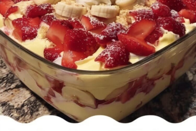 Southern classic layered dessert with homemade vanilla pudding, vanilla wafers, fresh banana slices, and strawberries. Egg yolks are tempered with warm milk, then cooked with cornstarch until thick and creamy. Layered while warm with fruit and cookies in a 9x13 dish, then chilled until set. The wafers soften perfectly while the pudding becomes firm and silky.