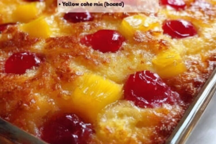 The easiest dessert you'll ever make: cherry pie filling and crushed pineapple topped with dry yellow cake mix and melted butter, baked until golden and bubbling. No mixing, no bowls, just layer and bake for a warm, gooey dessert with crispy topping. Perfect with vanilla ice cream melting into the warm fruit.