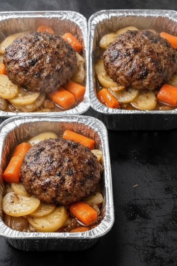 Complete one-packet meal: chicken, potatoes, carrots, bell peppers, and onions seasoned with garlic powder and paprika, sealed in foil and baked or grilled until everything is tender and juicy. Steam cooking keeps it moist while zero cleanup makes it perfect for busy nights, camping, or grilling. Customize with your favorite proteins and vegetables.