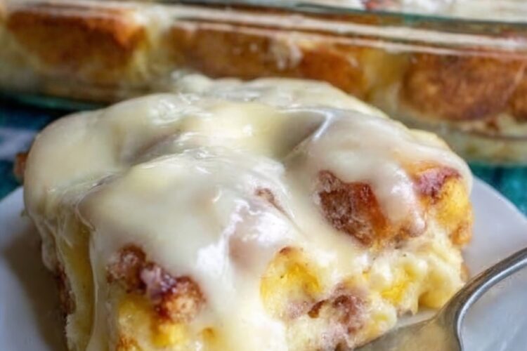 The ultimate make-ahead breakfast: refrigerated orange rolls cut into quarters, soaked overnight in a custard of eggs, cream, brown sugar, fresh orange juice and zest, then baked until golden with soft, custardy centers. Topped with homemade orange icing. All the flavor of homemade sweet rolls with 5 minutes of prep the night before.