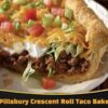 A quick and easy casserole made with flaky crescent dough, seasoned beef, and melted cheese for a comforting and flavorful dinner.