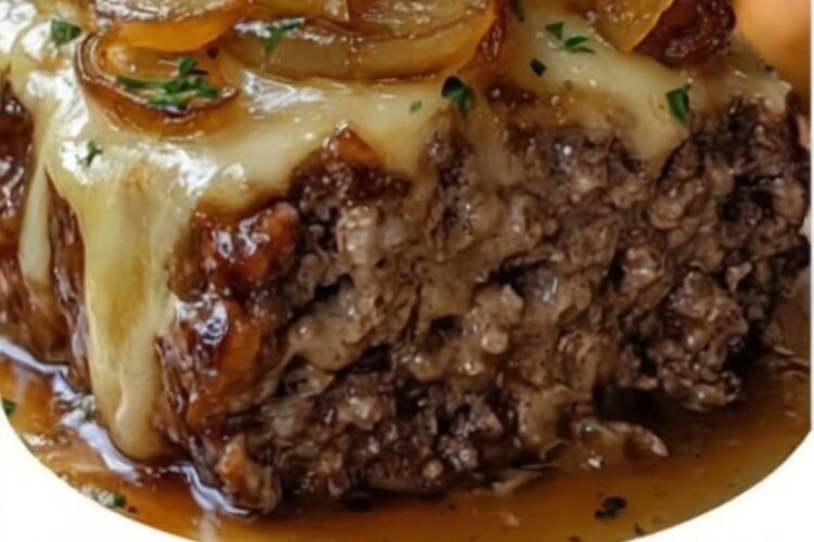 A tender, juicy meatloaf slow-cooked to perfection and topped with melted Swiss cheese — the ultimate easy comfort food dinner for family meals and busy days.