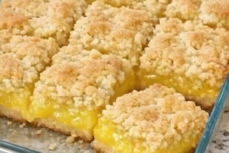 A quick and easy dessert made with lemon cake mix, pie filling, and butter, delivering a perfect balance of sweet and tangy flavors.