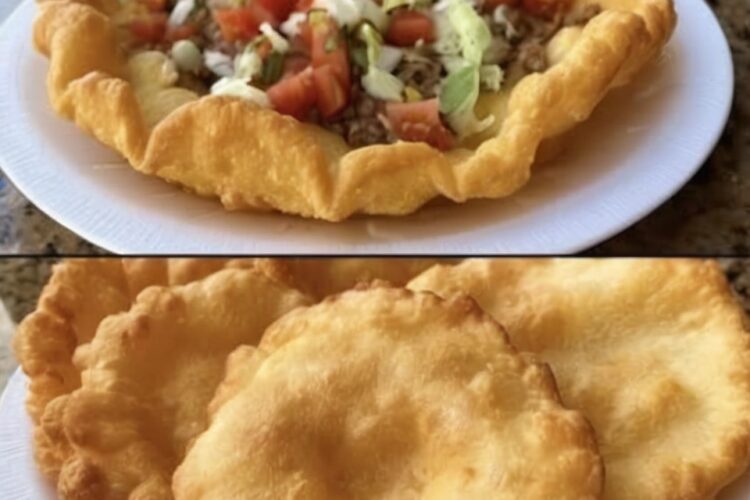 Crispy and fluffy fry bread topped with seasoned meat and fresh ingredients, perfect for a hearty and satisfying meal.