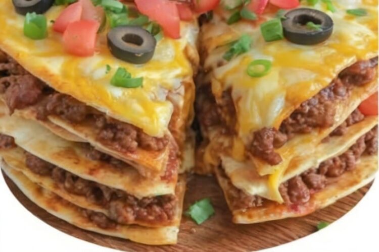 A crispy, layered tortilla dish filled with seasoned beef, beans, and melted cheese — perfect for an easy family dinner or weekend comfort meal.