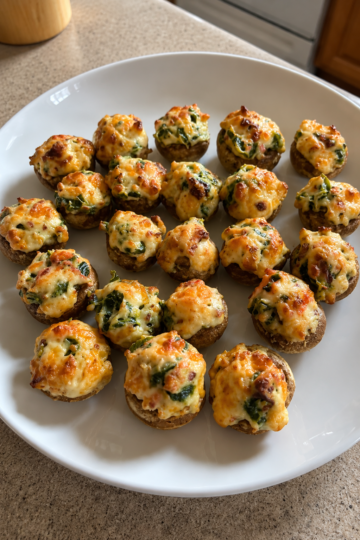 Elegant baked crab stuffed mushrooms made with lump crabmeat, parmesan, panko, Dijon, and lemon. Perfect holiday appetizer or dinner party seafood starter.