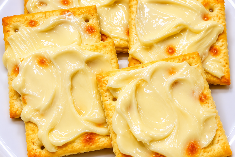 A simple nostalgic snack made with saltine crackers and real butter. An easy no-cook comfort food perfect for late-night cravings or light bites.