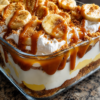 A creamy layered dessert made with Lotus Biscoff cookies, vanilla pudding, fresh bananas, whipped cream, and caramel sauce. Perfect no-bake party dessert.