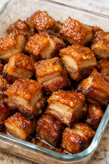 Oven-roasted pork belly cubes with golden, shatteringly crisp edges and juicy interiors. A simple 3-ingredient appetizer perfect for parties and entertaining.