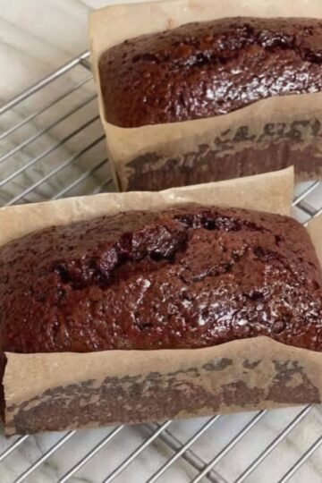 A rich, moist chocolate loaf cake made with cocoa powder and hot coffee for deep chocolate flavor. Perfect for slicing and serving anytime.