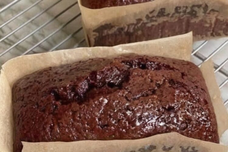 A rich, moist chocolate loaf cake made with cocoa powder and hot coffee for deep chocolate flavor. Perfect for slicing and serving anytime.