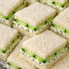 A refreshing Southern classic made with thin cucumber slices, creamy spread, and soft white bread. Perfect for tea parties, showers, and light lunches.