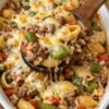 A hearty, family-style baked pasta that captures the flavors of traditional stuffed peppers in an easy one-dish casserole. Perfect for weeknight dinners, meal prep, and comfort food cravings.