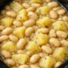 A simple, budget-friendly slow cooker comfort meal made with white beans, tender potatoes, and buttery broth. Perfect for busy weeknights, meal prep, and cozy family dinners.