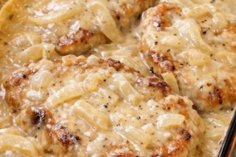 An easy, budget-friendly comfort food dinner made with bone-in pork chops and creamy onion gravy. Perfect for busy weeknights and family meals.