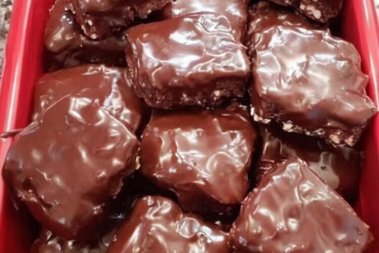 Rich, fudgy brownie bars topped with a smooth, glossy chocolate coating for the ultimate double chocolate dessert.
