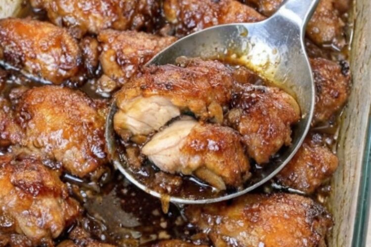 A sweet and savory baked chicken dish made with only three ingredients. Juicy chicken thighs coated in a caramelized brown sugar glaze with deep savory flavor. Perfect for potlucks and family dinners.