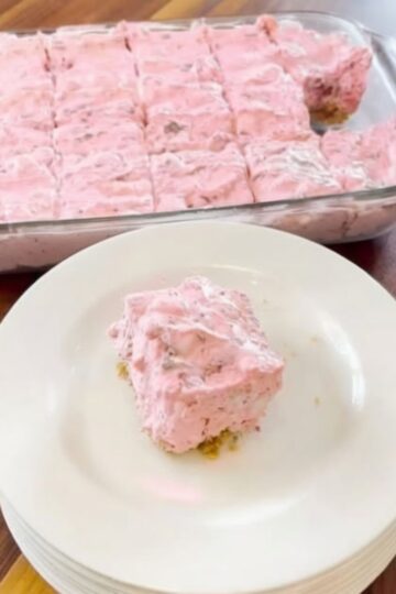A creamy, layered no-bake dessert with buttery graham cracker crust, smooth cream cheese filling, and fresh strawberries. Perfect for summer gatherings.