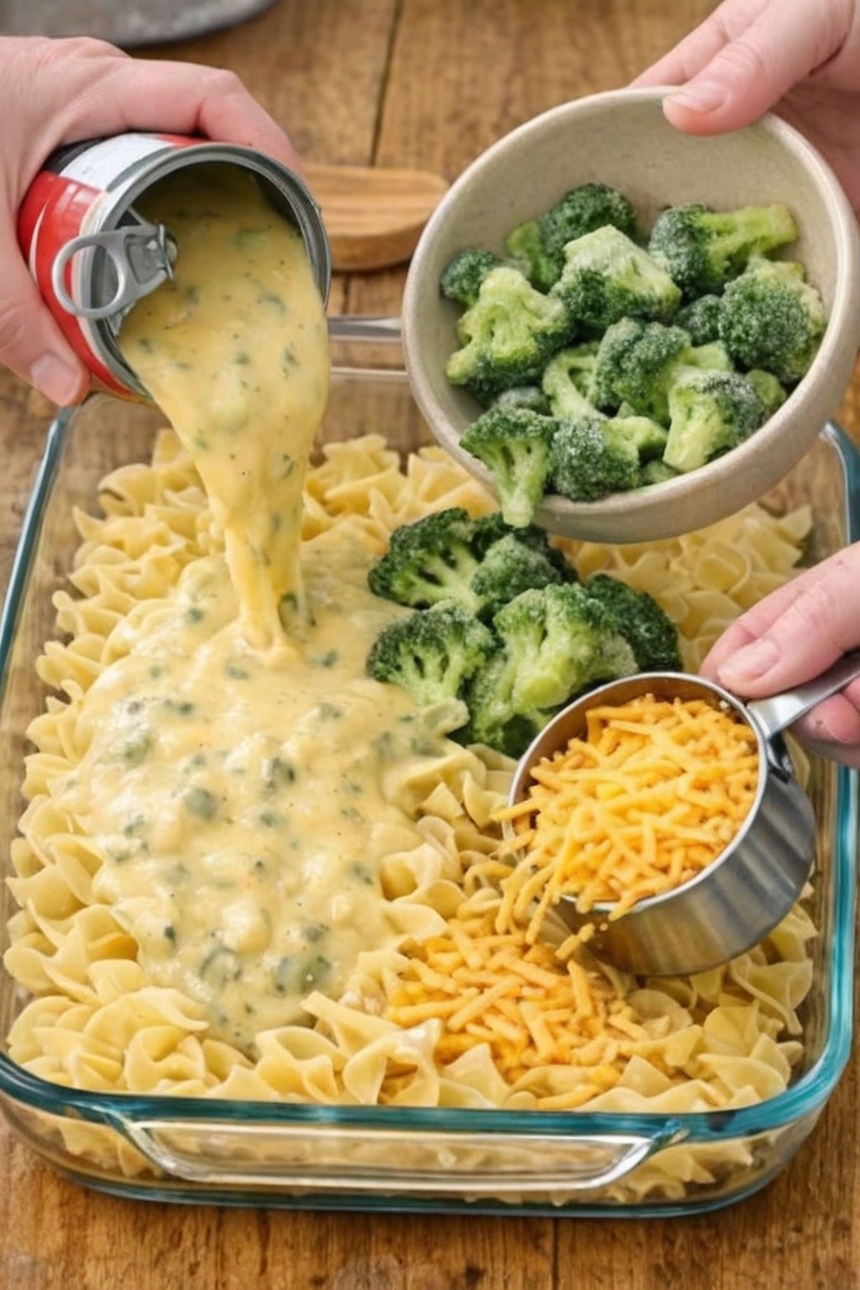 An easy, four-ingredient baked pasta casserole made with dry egg noodles, cheddar broccoli soup, milk, and shredded cheddar cheese. Perfect for busy weeknight dinners and comfort food cravings.