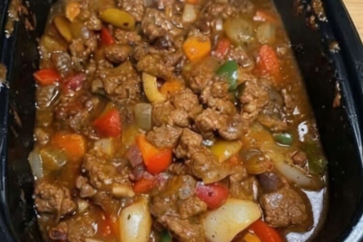 Tender beef slow-cooked with bell peppers and onions in a savory soy-ginger sauce. An easy crockpot dinner perfect for busy weeknights and family meal prep.