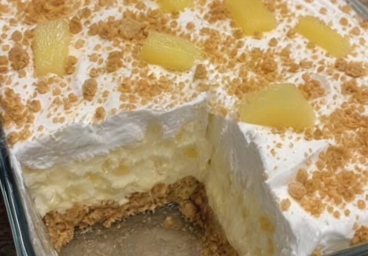 This No-Bake Pineapple Cream Dessert combines a buttery graham cracker crust with a creamy pineapple cheesecake filling and fluffy whipped topping for an easy make-ahead dessert everyone loves. Perfect for summer parties, family gatherings, potlucks, holiday celebrations, and backyard cookouts, this refreshing no-bake pineapple dessert delivers tropical flavor with minimal effort and no oven required.