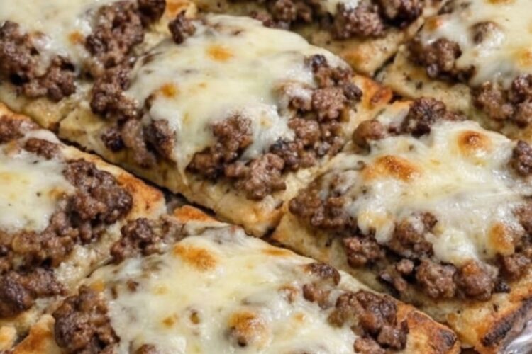 These Oven-Baked 4-Ingredient Beef Flatbread Squares are a crispy, protein-packed comfort food recipe featuring lean ground beef, melted provolone cheese, and golden flatbread baked to perfection in just 20 minutes. Ideal for family dinners, easy weeknight meals, football parties, casual entertaining, meal prep lunches, and budget-conscious grocery planning, this simple homemade recipe delivers restaurant-quality flavor with minimal ingredients while pairing perfectly with fresh salads, homemade soups, and wholesome side dishes.