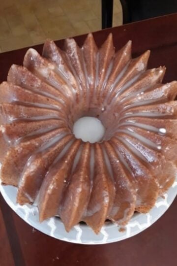 This classic 7UP Pound Cake is a buttery Southern Bundt cake made with simple pantry ingredients and finished with a sweet lemon glaze. The lemon-lime soda creates an incredibly moist, tender crumb while the buttery texture makes every bite melt in your mouth. Perfect for Sunday dinners, holiday dessert tables, Easter brunch, Christmas gatherings, family celebrations, bake sales, and afternoon coffee.