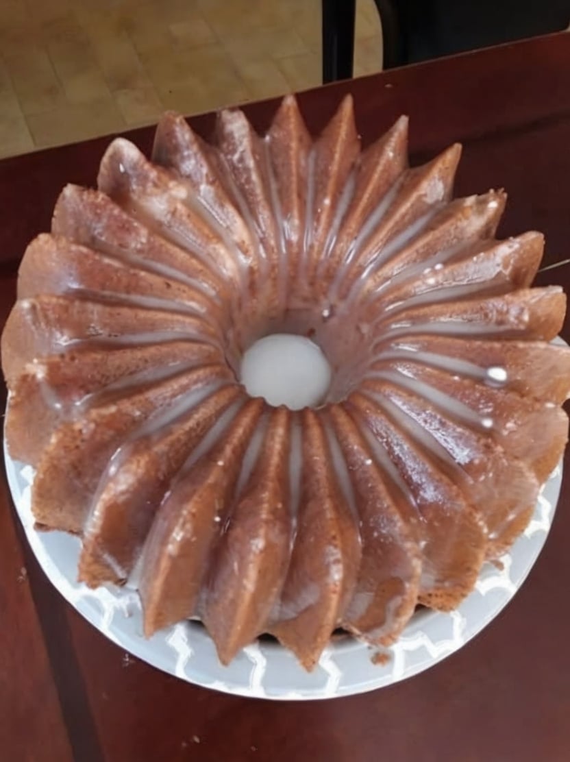 This classic 7UP Pound Cake is a buttery Southern Bundt cake made with simple pantry ingredients and finished with a sweet lemon glaze. The lemon-lime soda creates an incredibly moist, tender crumb while the buttery texture makes every bite melt in your mouth. Perfect for Sunday dinners, holiday dessert tables, Easter brunch, Christmas gatherings, family celebrations, bake sales, and afternoon coffee.
