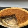 A classic Kentucky-style Derby Pie featuring a flaky buttery crust filled with rich chocolate chips, toasted pecans, vanilla, and a gooey brownie-like filling. Perfect for holidays, Derby parties, potlucks, Sunday dinners, and chocolate lovers.
