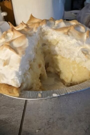 A rich homemade Coconut Cream Pie featuring silky vanilla coconut custard, flaky pie crust, and fluffy toasted meringue. Perfect for Easter, Thanksgiving, Christmas, Mother's Day, potlucks, and family celebrations.