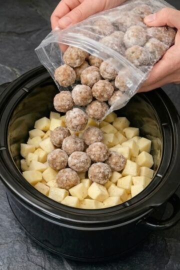 A hearty crockpot stew featuring tender meatballs, potatoes, carrots, celery, and onions simmered in a rich beef gravy. The perfect one-pot comfort food for busy weeknights, meal prep, and family dinners.