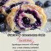 Golden buttery crescent rolls filled with creamy vanilla cheesecake filling and juicy blueberries, finished with powdered sugar for an easy bakery-style breakfast or dessert.