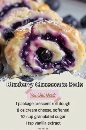 Golden buttery crescent rolls filled with creamy vanilla cheesecake filling and juicy blueberries, finished with powdered sugar for an easy bakery-style breakfast or dessert.