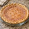 This classic Old-Fashioned Sugar Cream Pie, also known as Indiana Hoosier Pie, features a silky cream filling baked inside a flaky pie crust and finished with a buttery cinnamon-sugar topping. It's an easy vintage dessert that's perfect for holidays, Sunday dinners, or anytime you're craving homemade comfort.