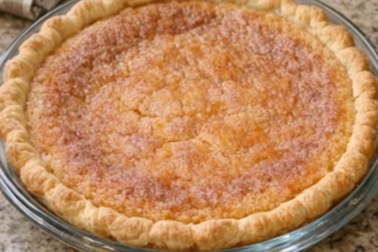 This classic Old-Fashioned Sugar Cream Pie, also known as Indiana Hoosier Pie, features a silky cream filling baked inside a flaky pie crust and finished with a buttery cinnamon-sugar topping. It's an easy vintage dessert that's perfect for holidays, Sunday dinners, or anytime you're craving homemade comfort.