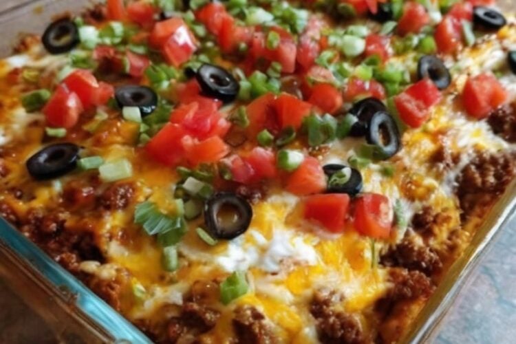 A cheesy keto taco casserole loaded with seasoned ground beef, cream cheese, sour cream, cheddar, and mozzarella. High in protein, low in carbs, and perfect for meal prep, weight loss goals, and easy family dinners.
