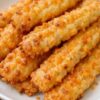 Classic Southern cheese straws made with sharp cheddar, butter, flour, and cayenne pepper. Crispy, buttery, and perfect for holidays, parties, and entertaining.