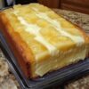 A rich and buttery Southern-style pound cake loaded with pineapple, cream cheese, and finished with a sweet pineapple glaze.