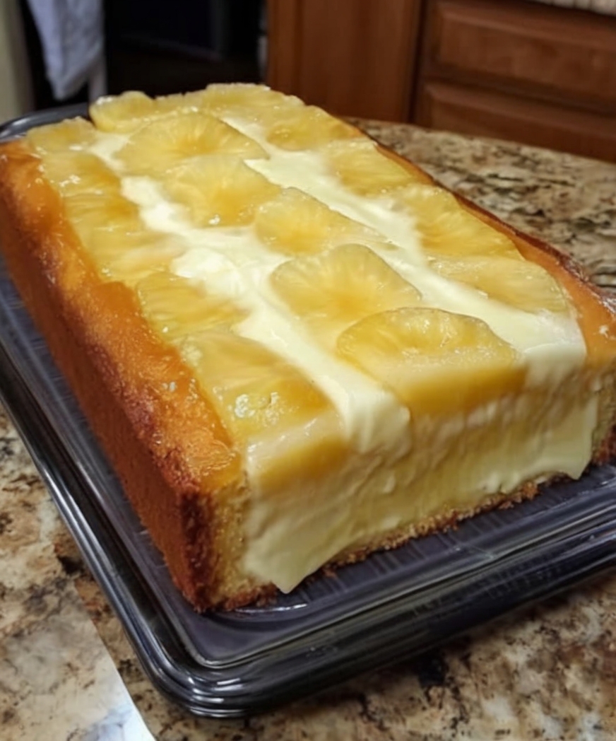 A rich and buttery Southern-style pound cake loaded with pineapple, cream cheese, and finished with a sweet pineapple glaze.