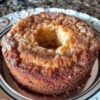 Ridiculously easy homemade cake that looks fancy but requires no special technique. Cake mix combined with instant vanilla pudding, eggs, oil, and water, then layered with cinnamon-sugar mixture in a bundt pan. Gentle swirling creates ribbons throughout. The result: incredibly soft, buttery cake with a crackly cinnamon-sugar crust on top. Bakes in 45-50 minutes. Perfect for easy weeknight entertaining and comfort food cravings. People literally hide slices.