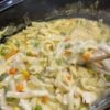 This Slow Cooker Creamy Chicken & Noodles is the ultimate cozy comfort food made with tender rotisserie chicken, hearty vegetables, silky egg noodles, and a rich, velvety broth. Perfect for busy weeknight dinners, family meal prep, budget-friendly comfort cooking, and high-protein homemade meals, this easy crockpot recipe delivers restaurant-quality flavor with minimal effort while naturally fitting into a wholesome family lifestyle.