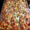 An easy breakfast casserole loaded with fluffy eggs, tender potatoes, savory ham, sautéed peppers, onions, and melted cheddar cheese. Perfect for brunch, meal prep, holidays, and family breakfasts.
