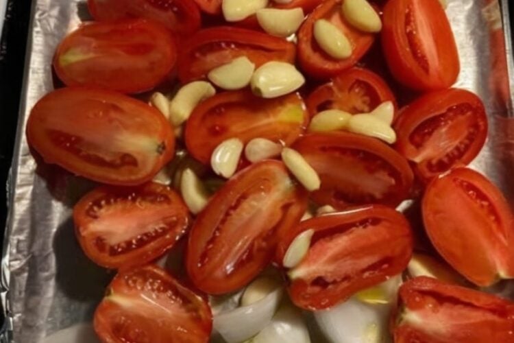 A rich homemade roasted tomato sauce made with fresh Roma tomatoes, roasted garlic, onions, basil, and olive oil. Perfect for pasta, pizza, lasagna, chicken, meal prep, and freezer-friendly family dinners.
