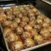 These Cheesy Baked Meatballs are tender, juicy, and topped with melted cheddar cheese, diced tomatoes, and sweet bell peppers. Ready in about 35 minutes, this easy one-pan dinner is perfect for busy weeknights or cozy family meals.