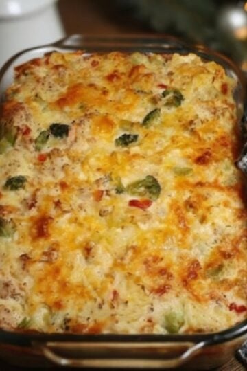 This Cheesy Chicken Broccoli Rice Casserole is a creamy, comforting family dinner made with tender chicken, fluffy rice, broccoli, cheddar cheese, and a rich homemade sauce. It's perfect for busy weeknights, holiday gatherings, meal prep, or using leftover rotisserie chicken.