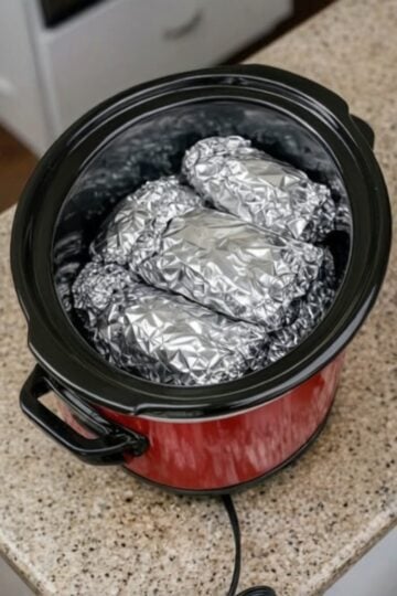 These Chicken Fajita Foil Packets are an easy, healthy dinner made with juicy chicken, colorful bell peppers, onions, homemade fajita seasoning, and fresh lime juice. Cook them in the oven, on the grill, or over a campfire for a flavorful meal with almost no cleanup.