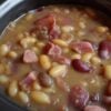 This Slow Cooker Ham and Bean Soup is packed with tender mixed beans, smoky ham, onions, garlic, and warm spices for a hearty, comforting meal. It's an easy dump-and-go recipe that's perfect for cozy family dinners, meal prep, or using leftover holiday ham.