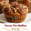 Pecan pie muffins with golden caramelized edges, soft buttery centers, chopped pecans inside, glossy pecan halves on top, and a light dusting of powdered sugar.