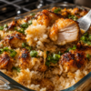 Teriyaki Chicken Casserole baked with tender chicken, fluffy white rice, broccoli, carrots, red bell peppers, and homemade teriyaki sauce, garnished with sesame seeds and green onions for an easy family dinner.
